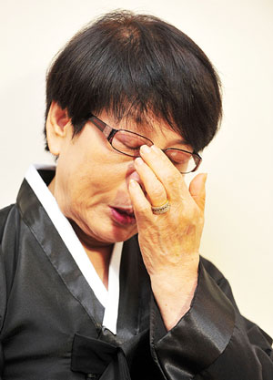 황장엽 수양딸 사기사건 피소 전말