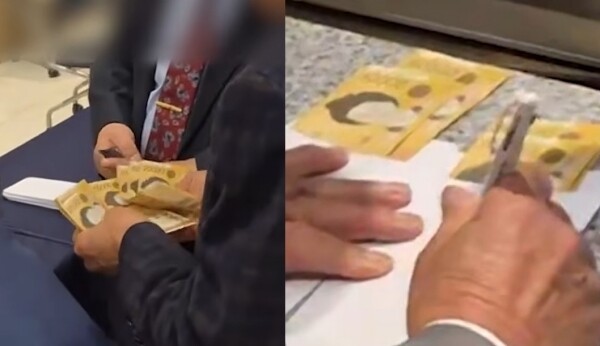 더불어민주당 전재수 의원이 지난 2일 부산항컨벤션센터 5층에서 개최한 출판기념회에서 봉투에 5만원권 지폐가 다수 담긴 모습. 사진=매일신문 유튜브 영상 캡처